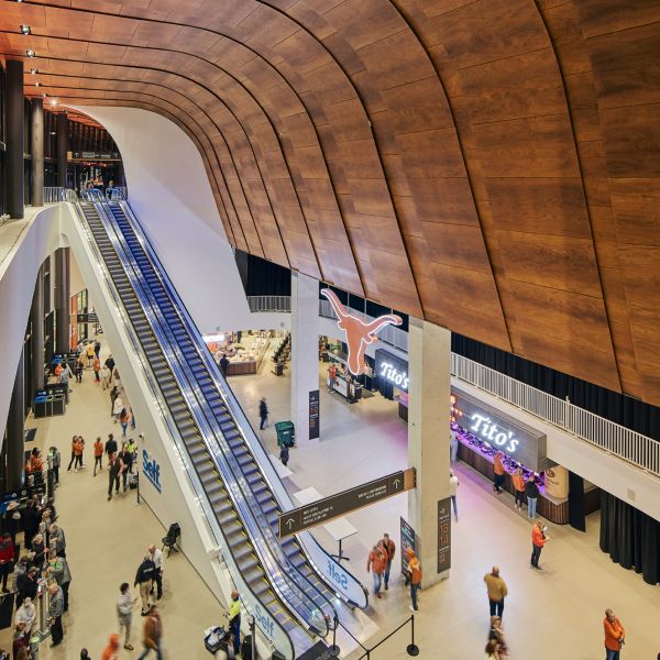 Inside of Moody Center with escalator