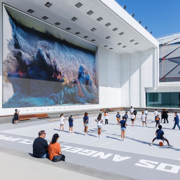 Public basketball court in the outdoor plaza at Intuit Dome