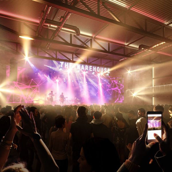 Rendering of a concert at the warehouse fanzone/event space at Villa Park