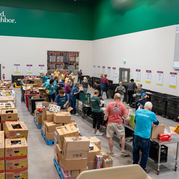 Volunteers working at the Food Bank of the Rockies distribution center