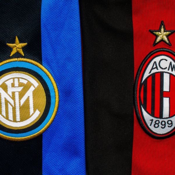 AC Milan and Inter Milan Logos on their respective jerseys