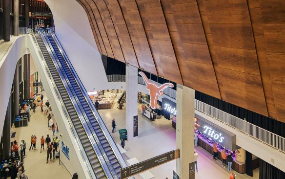 Inside of Moody Center with escalator