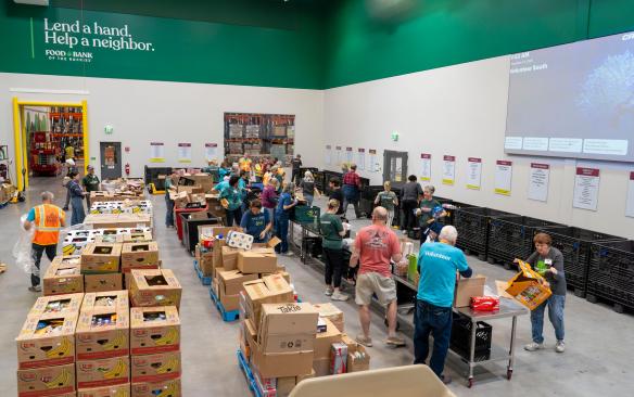 Volunteers working at the Food Bank of the Rockies distribution center