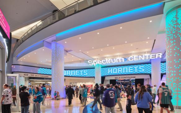 People walking around the concourse at Spectrum Center
