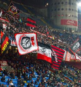 AC Milan flags flying in stadium