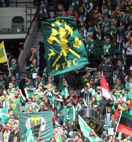 Portland Timbers flags flying in the crowd