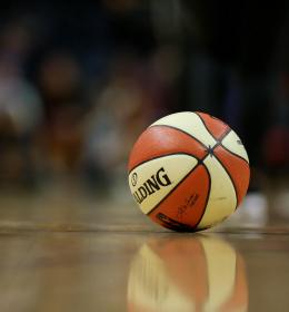 Basketball sitting on court