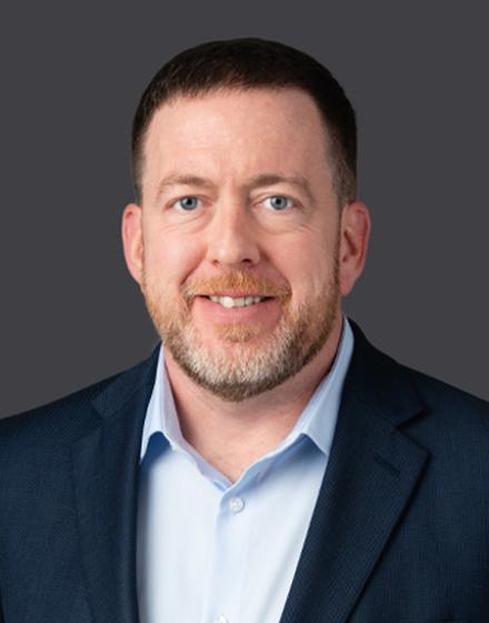 Headshot of Chris Daly
